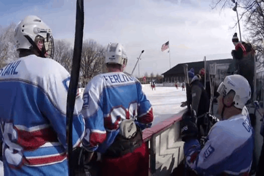 Darren McCarty jumps into STAHLS' bench at Frozen Fish Fiasco